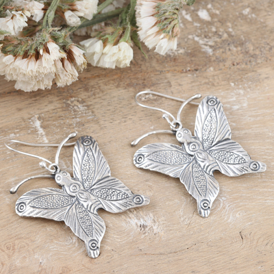 Sterling silver dangle earrings, 'Silver Transformation' - Sterling Silver Dangle Earrings with Shiny Butterflies