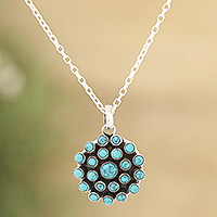 Sterling silver pendant necklace, 'Floral Burst' - Reconstituted Turquoise and Sterling Silver Pendant Necklace