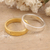 Gold-plated and sterling silver band rings, 'Graceful Duo' (pair) - Pair of One Gold-plated and One Sterling Silver Band Rings (image 2) thumbail