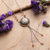 Ceramic and quartz Y necklace, 'Blossoming Mandala' - Mandala-Themed Hand-Painted Ceramic and Quartz Y Necklace