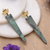 Brass dangle earrings, 'Triangular Delight' - Modern Triangular Brass Dangle Earrings with Green Patina