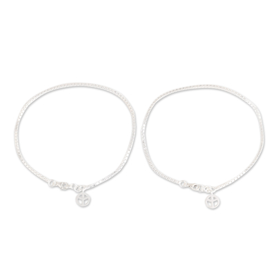 Sterling silver anklets, 'Radiant Peace' (pair) - Pair of Sterling Silver Anklets with Peace Charms