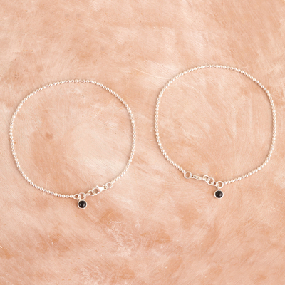 Onyx anklets, 'Courage Orbs' (pair) - Pair of Sterling Silver Onyx Anklets from India