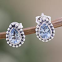 Blue topaz stud earrings, 'Dazzling Loyalty' - Sterling Silver Stud Earrings with Faceted Blue Topaz Gems