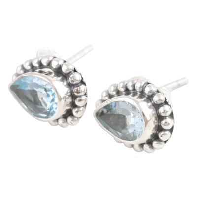 Blue topaz stud earrings, 'Dazzling Loyalty' - Sterling Silver Stud Earrings with Faceted Blue Topaz Gems