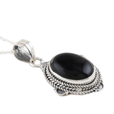 Onyx pendant necklace, 'Nocturnal Allure' - Black Onyx and Sterling Silver Pendant Necklace from India