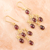Gold-plated garnet chandelier earrings, 'Crimson Palace' - 14k Gold-Plated Chandelier Earrings with Natural Garnet Gems (image 2) thumbail