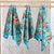 Cotton dish towels, 'Floral Greeting' (set of 3) - Set of 3 Turquoise Cotton Dish Towels with Floral Motifs (image 2) thumbail