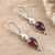 Garnet dangle earrings, 'Noble Passion' - Polished Sterling Silver Dangle Earrings with Faceted Garnet