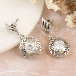 Rhodium-plated cubic zirconia dangle earrings, 'Hanging Swirl' - Rhodium-Plated Dangle Earrings with Cubic Zirconia Stones