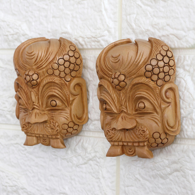 Wood wall sculptures, 'Nazar Battu Spell' (pair) - Pair of Kadam Wood Nazar Battu Wall Sculptures from India