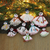 Embroidered viscose ornaments, 'Chekutty Hope' (set of 9) - Set of 9 Embroidered Viscose Doll Holiday Ornaments in White
