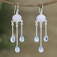 Rainbow moonstone and blue topaz dangle earrings, 'Exquisite Drops' - Rainbow Moonstone Blue Topaz Sterling Silver Dangle Earrings