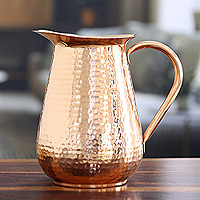Copper pitcher, 'Traditional Allure' - Polished Copper Pitcher with a Hammered Finish from India