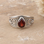 Garnet cocktail ring, 'Passion Drop' - Polished Sterling Silver Cocktail Ring with Natural Garnet