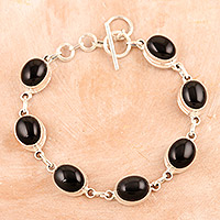 Onyx link bracelet, 'Protection Mysteries' - Black Onyx Link Bracelet Made from Sterling Silver in India