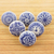 Ceramic knobs, 'Blue Imagination' (set of 6) - Set of 6 Handcrafted Blue Ceramic Knobs with Unique Patterns