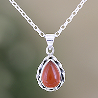 Onyx pendant necklace, 'Sunset Treasure' - Sterling Silver Pendant Necklace with Orange Onyx Cabochon