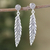 Sterling silver dangle earrings, 'Feathered Luxury' - Feather-Themed Sterling Silver Dangle Earrings from India (image 2) thumbail