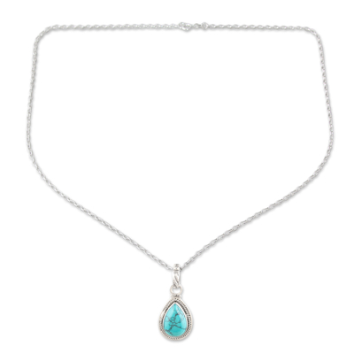 Sterling silver pendant necklace, 'Cool Halo Effect' - Sterling Silver Pendant Necklace with Recon Turquoise Gem