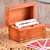 Wood deck box, 'Fortune Secrets' - Handmade Brown Acacia Wood Deck Box with Inlaid Brass Motifs