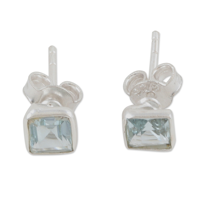 Blue topaz stud earrings, 'Subtle Glimmer' - Sterling Silver Stud Earrings with Blue Topaz Gemstone