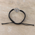 Cubic zirconia macrame pendant bracelet, 'Bonds of Knowledge' - Black Macrame Cord Bracelet with Khanda Pendant and Gems