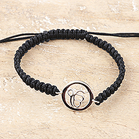 Macrame sterling silver pendant bracelet, 'Altar to Divinity' - Black Macrame Bracelet with Sterling Silver Ek Onkar Symbol
