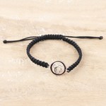 Macrame sterling silver pendant bracelet, 'Altar to Divinity' - Black Macrame Bracelet with Sterling Silver Ek Onkar Symbol