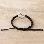 Macrame sterling silver pendant bracelet, 'Altar to Divinity' - Black Macrame Bracelet with Sterling Silver Ek Onkar Symbol