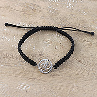 Macrame sterling silver pendant bracelet, 'Altar to Enlightenment' - Black Macrame Cord Bracelet with Sterling Silver Om Symbol
