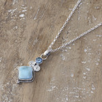 Blue topaz and larimar pendant necklace, 'Pastel Seas' - Blue Topaz and Larimar Sterling Silver Pendant Necklace