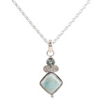 Blue topaz and larimar pendant necklace, 'Pastel Seas' - Blue Topaz and Larimar Sterling Silver Pendant Necklace