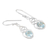Blue topaz dangle earrings, 'Loyal Twists' - Polished Sterling Silver Dangle Earrings with Blue Topaz
