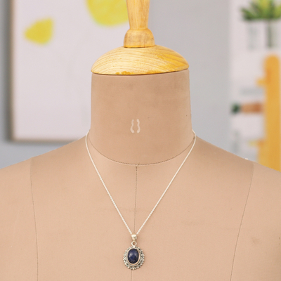 Lapis lazuli pendant necklace, 'Royal Jewel' - Sun-Themed Pendant Necklace with Oval Lapis Lazuli Stone