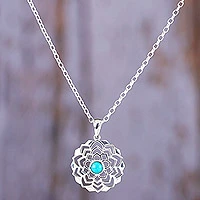 Sterling silver pendant necklace, 'Tranquil Lotus' - Sterling Silver Lotus Pendant Necklace with Recon Turquoise