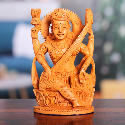 Wood sculpture, 'Divine Melody' - Hand-Carved Kadam Wood Sculpture of the Saraswati Goddess