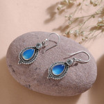 Chalcedony and blue topaz dangle earrings, 'Heaven's Triumph' - Chalcedony Cabochon and Blue Topaz Dangle Earrings