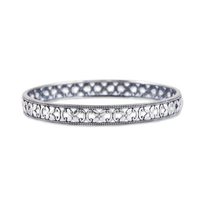 Sterling silver bangle bracelet, 'Primaveral Beauty' - Polished Flower-Themed Sterling Silver Bangle Bracelet