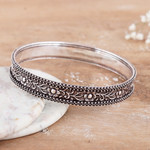 Sterling silver bangle bracelet, 'Flourishing Beauty' - Flower and Leaf-Themed Sterling Silver Bangle Bracelet