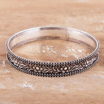 Sterling silver bangle bracelet, 'Flourishing Beauty' - Flower and Leaf-Themed Sterling Silver Bangle Bracelet