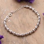 Sterling silver beaded bracelet, 'Divine Whispers' - Hammered and Polished Sterling Silver Beaded Bracelet