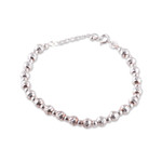 Sterling silver beaded bracelet, 'Divine Whispers' - Hammered and Polished Sterling Silver Beaded Bracelet