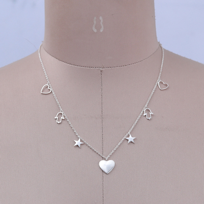 Sterling silver charm necklace, 'Magic Desires' - Heart, Star and Hamsa-Themed Sterling Silver Charm Necklace