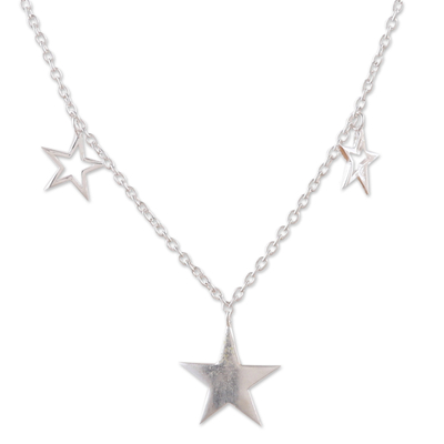 Sterling silver charm necklace, 'Starry Desires' - High-Polished Star-Themed Sterling Silver Charm Necklace