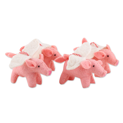 Wool felt ornaments, 'Flying Piggies' (set of 4) - Set of 4 Handcrafted Wool Felt Pig Ornaments from India