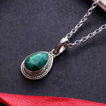 Emerald pendant necklace, 'Halo Effect in Green' - Sterling Silver Pendant Necklace with 3-Carat Emerald Gem