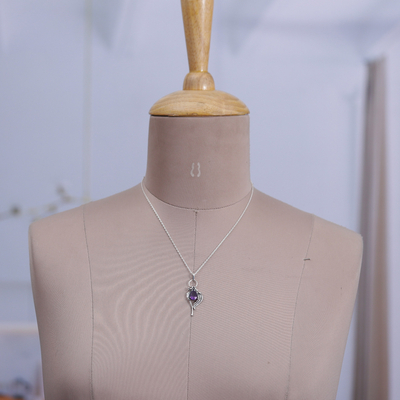 Amethyst pendant necklace, 'Violet Romance' - Leafy Faceted Two-Carat Amethyst Pendant Necklace from India