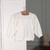 Embroidered blouse, 'Chic Shirring' - Embroidered White Blouse with Shirred Hem from India