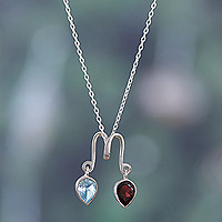 Garnet and blue topaz pendant necklace, 'Romantic Reflection' - Classic One-Carat Garnet and Blue Topaz Pendant Necklace